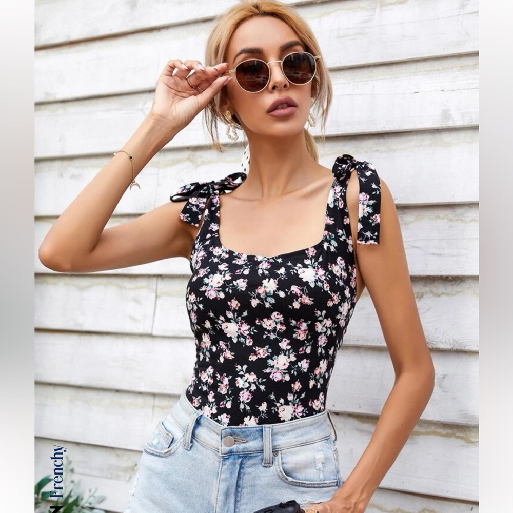 Floral black bodysuit.